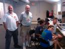 Stephen Misel K4WEB (ASEC Central NC) and Tom Brown N4TAB (SEC NC) visiting the operators of Four County ARES on opening day.